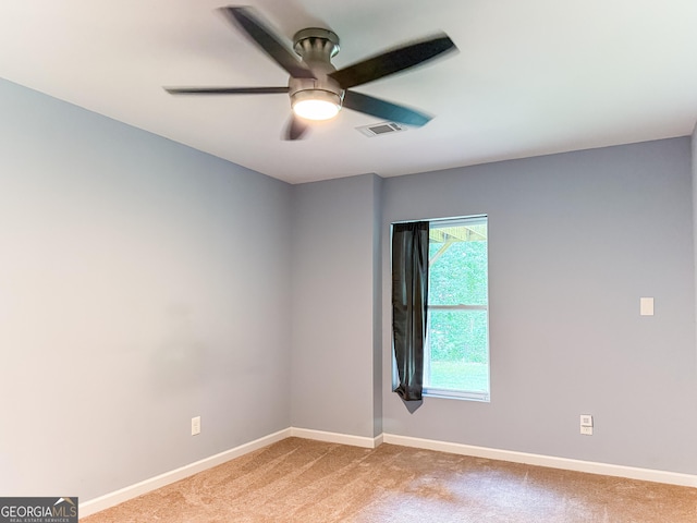 35 Paddle Boat Cv, Senoia, GA 30276 - empty room with light carpet and a ceiling fan