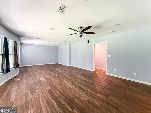 35 Paddle Boat Cv, Senoia, GA 30276 - unfurnished room with a ceiling fan and dark wood-style flooring
