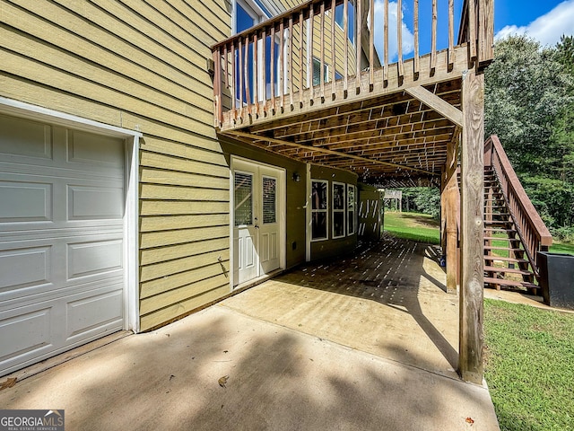 35 Paddle Boat Cv, Senoia, GA 30276 - view of patio / terrace featuring stairway, a garage, and a wooden deck