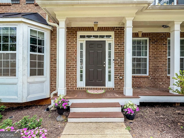 35 Paddle Boat Cv, Senoia, GA 30276 - doorway to property featuring brick siding and a porch