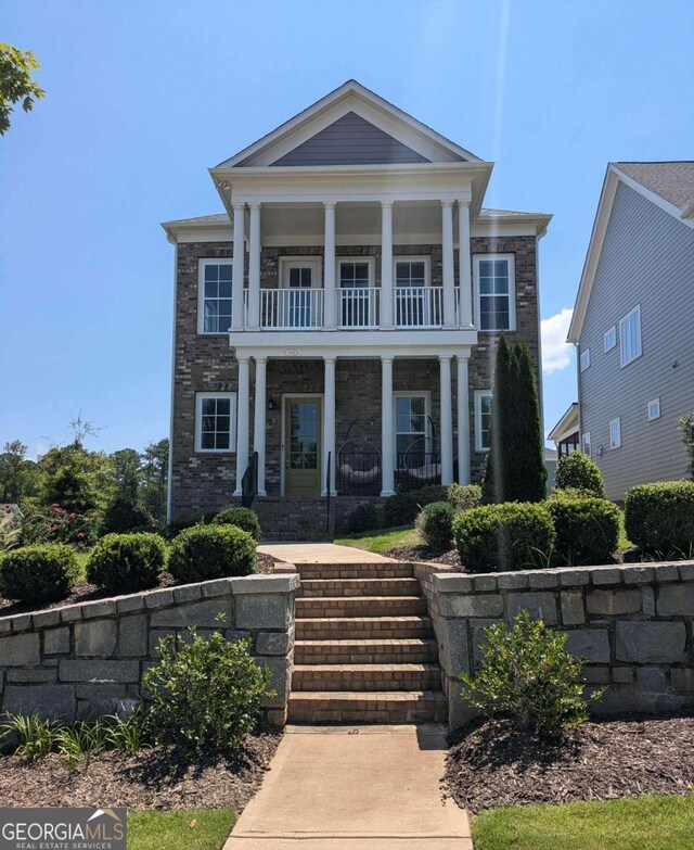 545 Hanlon Way, Alpharetta, GA 30009 - greek revival house featuring a balcony and covered porch