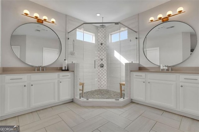 545 Hanlon Way, Alpharetta, GA 30009 - full bathroom featuring two vanities, a shower stall, and tile patterned floors
