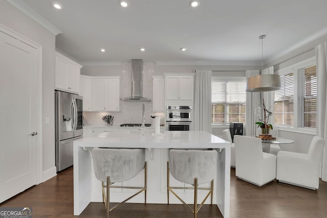 545 Hanlon Way, Alpharetta, GA 30009 - kitchen featuring wall chimney exhaust hood, appliances with stainless steel finishes, light countertops, decorative backsplash, and ornamental molding