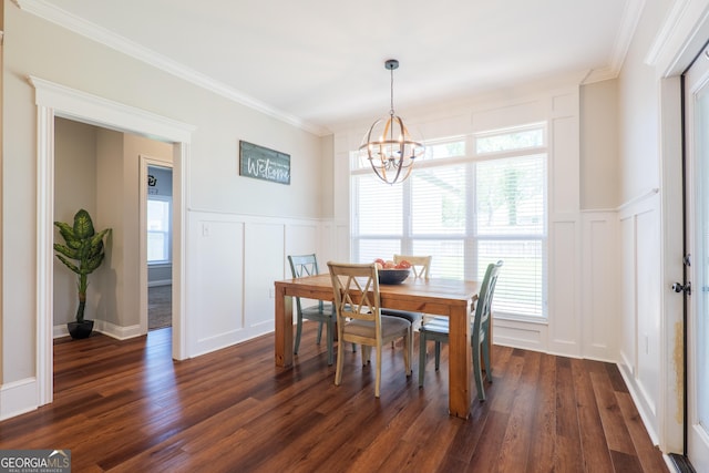 7270 Tillman Branch Rd, Hahira, GA 31632 - dining room featuring a decorative wall, a chandelier, healthy amount of natural light, dark wood-style flooring, and ornamental molding