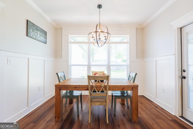 7270 Tillman Branch Rd, Hahira, GA 31632 - dining room with a decorative wall, a chandelier, dark wood-style floors, ornamental molding, and wainscoting