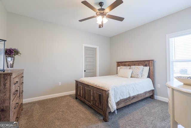 7270 Tillman Branch Rd, Hahira, GA 31632 - carpeted bedroom featuring baseboards and a ceiling fan