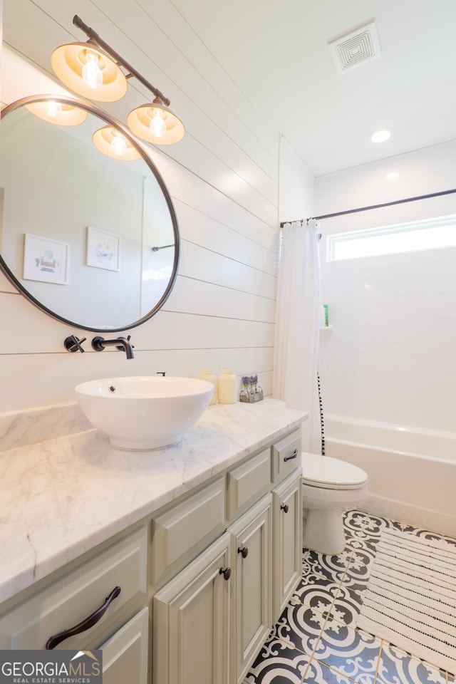7270 Tillman Branch Rd, Hahira, GA 31632 - full bathroom with vanity, shower / tub combo with curtain, and tile patterned flooring