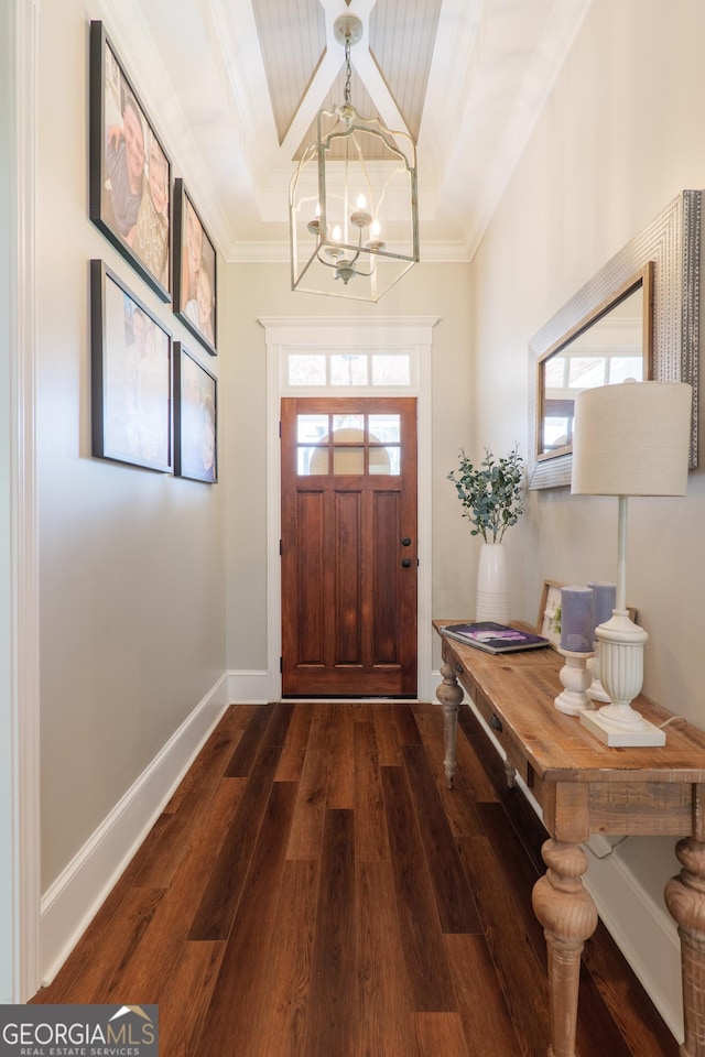 7270 Tillman Branch Rd, Hahira, GA 31632 - foyer with dark wood finished floors, a chandelier, ornamental molding, and beam ceiling