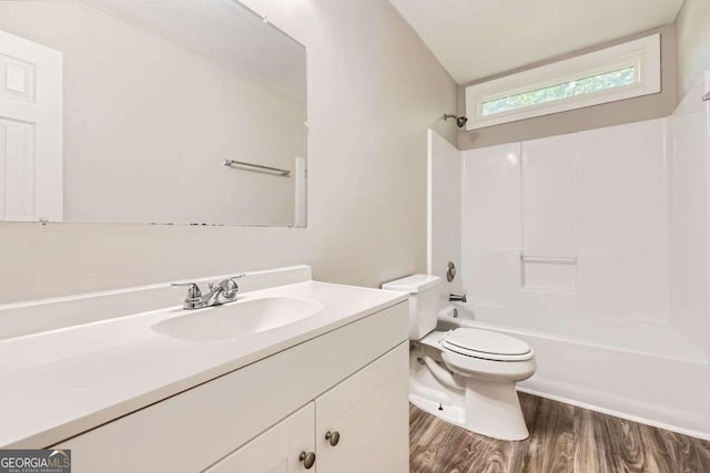 11473 Summer Creek Dr, Hampton, GA 30228 - full bathroom with vanity, wood finished floors, and shower / tub combination