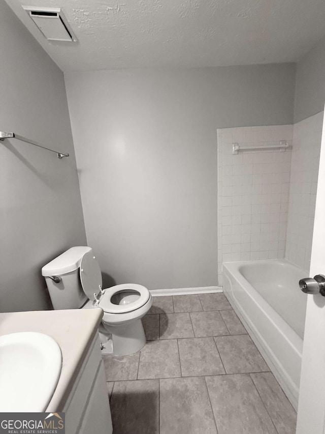 1081 Forest Path, Stone Mountain, GA 30088 - full bath with vanity, tile patterned floors, and a textured ceiling