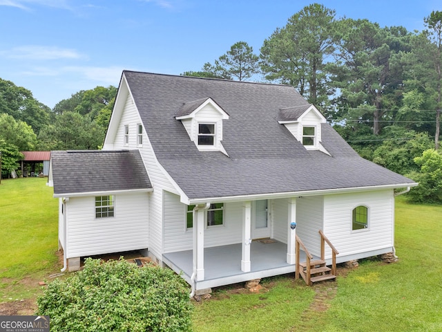 778 Leguin Mill Rd, Locust Grove, GA 30248 - view of front of house with a shingled roof, a front yard, and covered porch