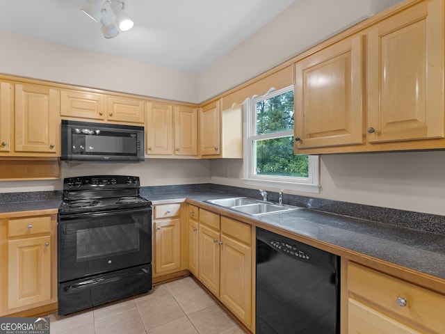778 Leguin Mill Rd, Locust Grove, GA 30248 - kitchen with black appliances, light brown cabinets, dark countertops, and light tile patterned floors