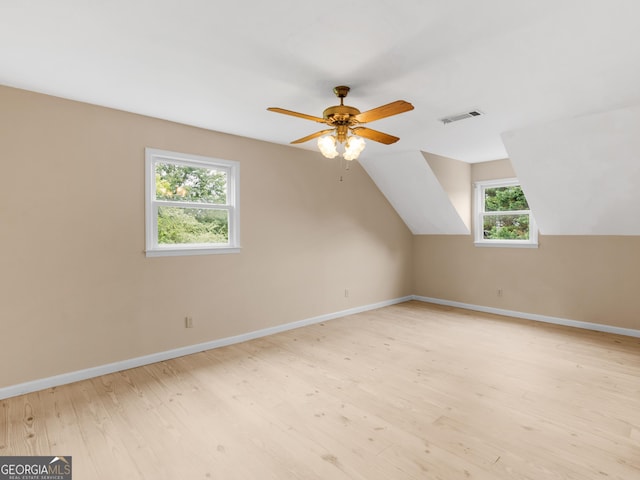 778 Leguin Mill Rd, Locust Grove, GA 30248 - additional living space featuring plenty of natural light, light wood-style floors, a ceiling fan, and lofted ceiling