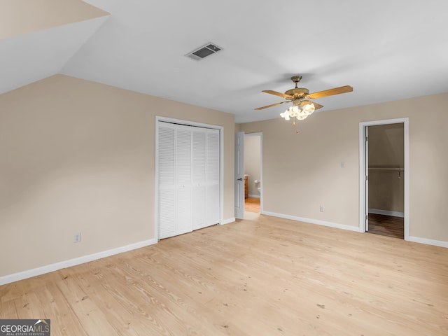 778 Leguin Mill Rd, Locust Grove, GA 30248 - unfurnished bedroom featuring a closet, light wood-type flooring, and ceiling fan