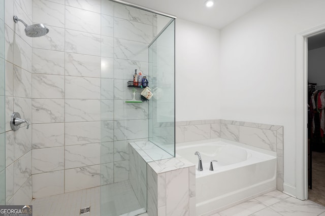 203 Holden Way, Woodstock, GA 30189 - full bath with marble finish flooring, a garden tub, a tile shower, a spacious closet, and recessed lighting