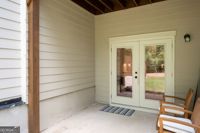 203 Holden Way, Woodstock, GA 30189 - view of exterior entry featuring french doors