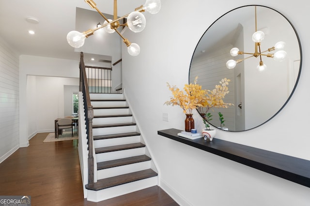 203 Holden Way, Woodstock, GA 30189 - stairs with a chandelier and wood finished floors