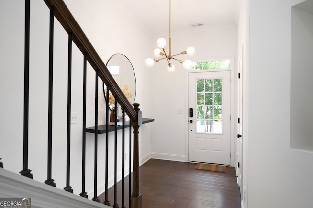 203 Holden Way, Woodstock, GA 30189 - entrance foyer featuring a chandelier, stairs, and dark wood-type flooring