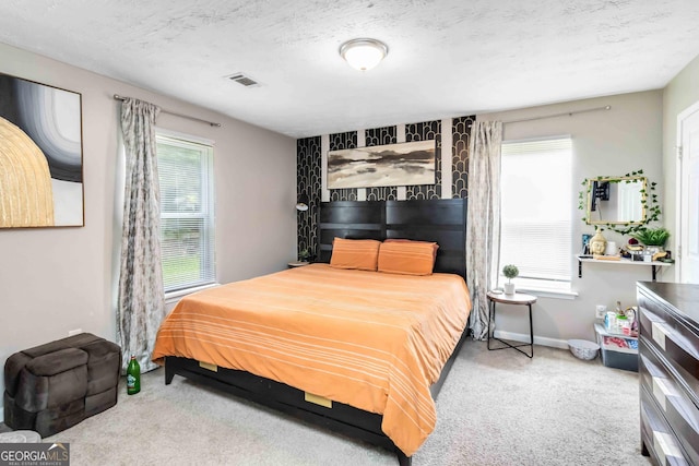1147 Dunivin Dr, Jonesboro, GA 30238 - bedroom featuring carpet and a textured ceiling