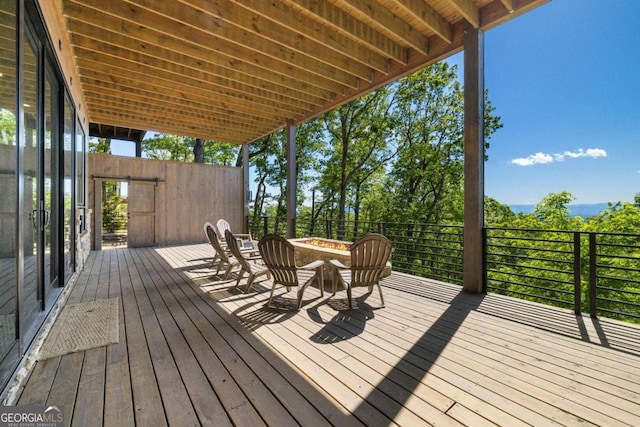 126 Wawayanda Dr, Mineral Bluff, GA 30559 - wooden terrace with a fire pit