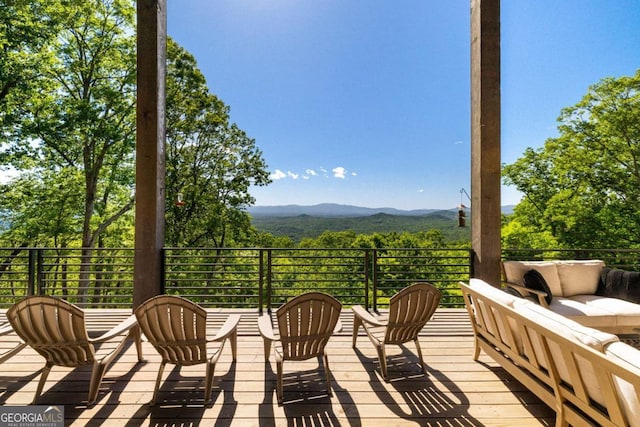 126 Wawayanda Dr, Mineral Bluff, GA 30559 - wooden deck with an outdoor hangout area and a mountain view