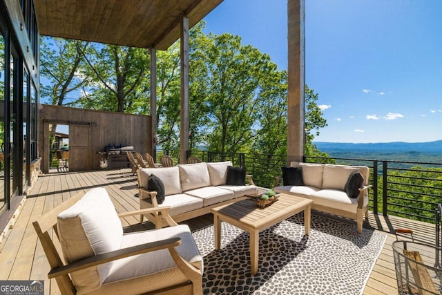 126 Wawayanda Dr, Mineral Bluff, GA 30559 - wooden terrace with an outdoor hangout area, a mountain view, and area for grilling