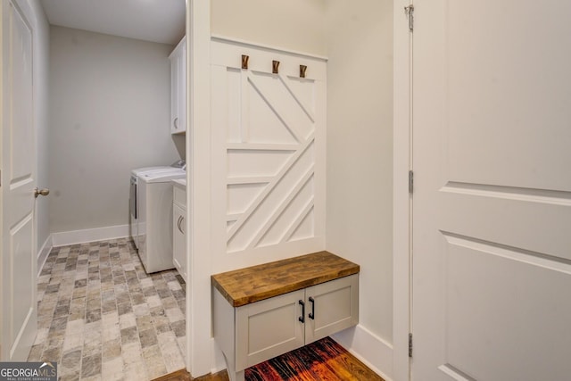 3076 E Lake Rd, Mcdonough, GA 30252 - washroom featuring cabinet space and independent washer and dryer