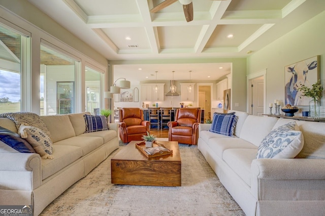 3076 E Lake Rd, Mcdonough, GA 30252 - living room with coffered ceiling, beamed ceiling, recessed lighting, and a ceiling fan