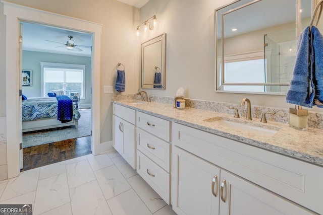 3076 E Lake Rd, Mcdonough, GA 30252 - bathroom featuring double vanity, ensuite bath, ceiling fan, and marble finish floors
