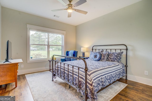3076 E Lake Rd, Mcdonough, GA 30252 - bedroom featuring wood finished floors and ceiling fan