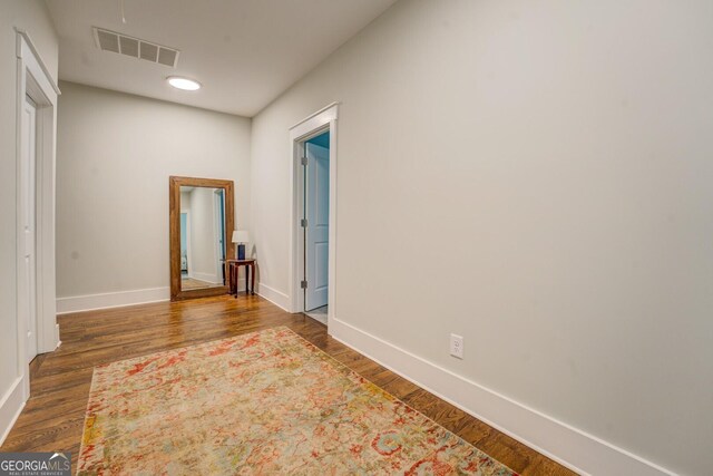 3076 E Lake Rd, Mcdonough, GA 30252 - spare room with wood finished floors and baseboards