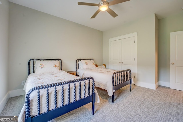 3076 E Lake Rd, Mcdonough, GA 30252 - carpeted bedroom featuring a closet and a ceiling fan