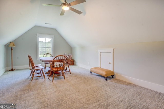 3076 E Lake Rd, Mcdonough, GA 30252 - dining space featuring vaulted ceiling, carpet, and ceiling fan