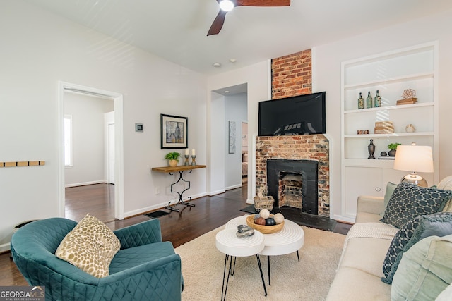 496 Rankin St NE, Atlanta, GA 30308 - living area featuring wood finished floors, ceiling fan, and a brick fireplace