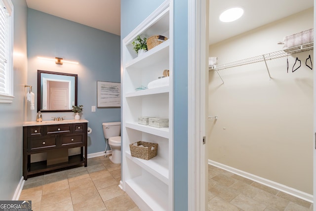 496 Rankin St NE, Atlanta, GA 30308 - bathroom with vanity and a walk in closet