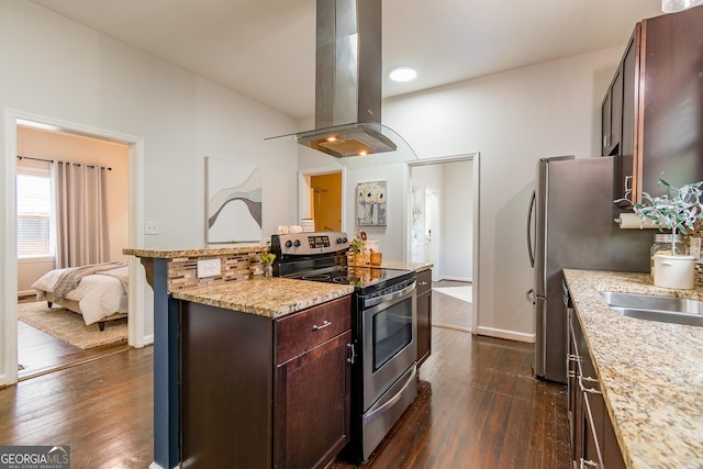 496 Rankin St NE, Atlanta, GA 30308 - kitchen with stainless steel electric stove, island exhaust hood, dark wood-style flooring, dark brown cabinets, and light stone counters