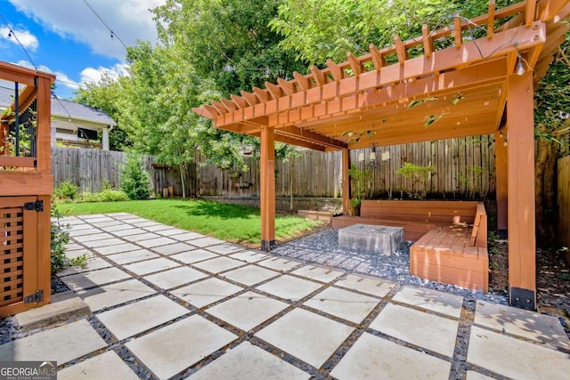 496 Rankin St NE, Atlanta, GA 30308 - fenced backyard featuring a patio and a pergola