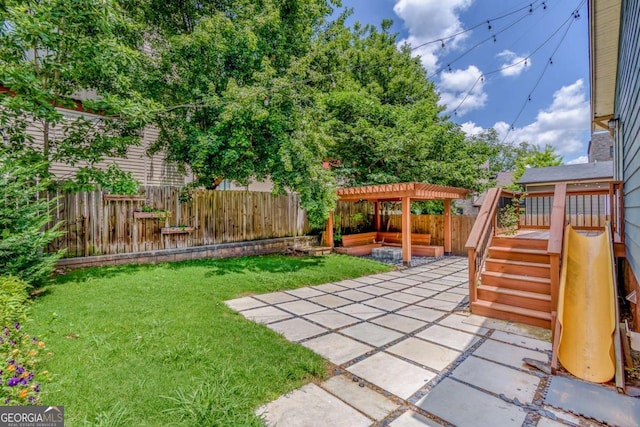 496 Rankin St NE, Atlanta, GA 30308 - fenced backyard featuring a pergola, a patio area, and a deck