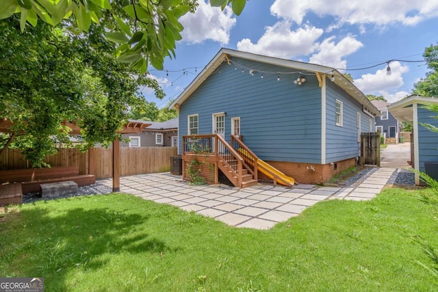 496 Rankin St NE, Atlanta, GA 30308 - back of property featuring a patio area and crawl space