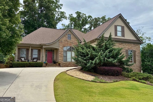 1976 Hedge Brooke Trl NW, Acworth, GA 30101 - view of front of property featuring stone siding, a front yard, and roof with shingles
