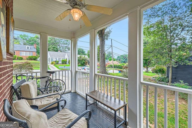 1134 Jefferson Ave, East Point, GA 30344 - sunroom with ceiling fan, a water view, and a residential view