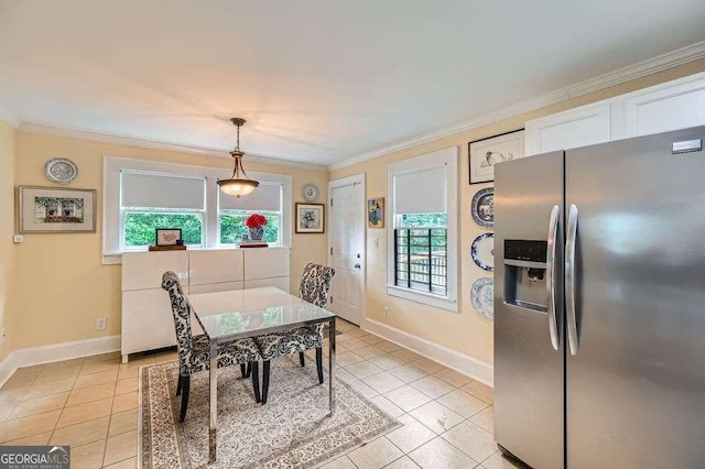 1134 Jefferson Ave, East Point, GA 30344 - dining room featuring light tile patterned floors and ornamental molding