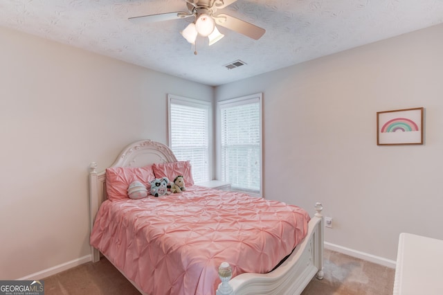 1406 Marshview Ct, Hoschton, GA 30548 - bedroom with carpet floors, ceiling fan, and a textured ceiling