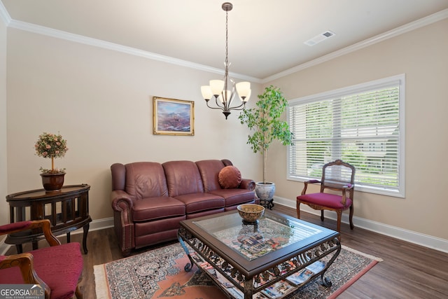 1001 Hartwell Rd, Locust Grove, GA 30248 - living room with crown molding, a chandelier, and wood finished floors