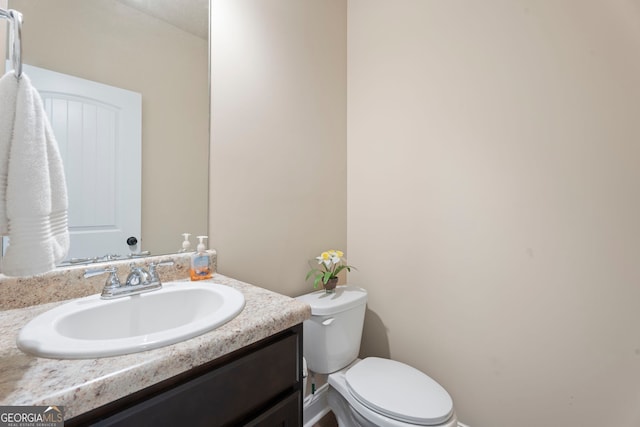 1001 Hartwell Rd, Locust Grove, GA 30248 - bathroom featuring vanity and toilet