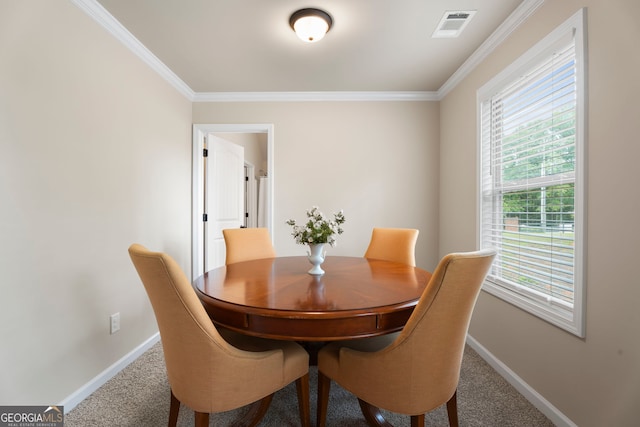1001 Hartwell Rd, Locust Grove, GA 30248 - dining space featuring carpet flooring and ornamental molding