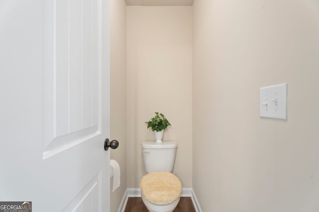 1001 Hartwell Rd, Locust Grove, GA 30248 - bathroom featuring wood finished floors and baseboards