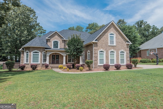 303 Sage Meadows Ln, Bonaire, GA 31005 - view of front of property with brick siding and a front yard