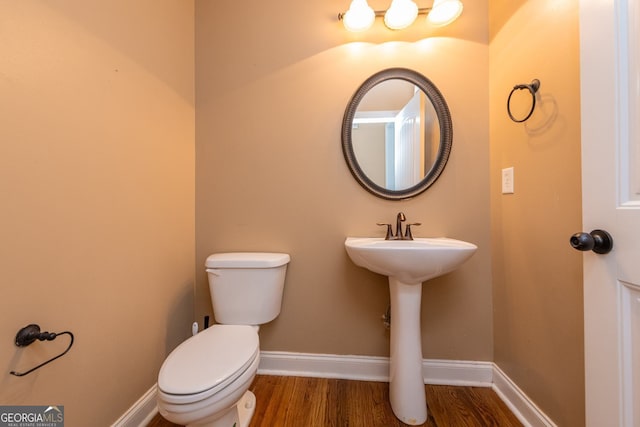 303 Sage Meadows Ln, Bonaire, GA 31005 - bathroom featuring toilet and wood finished floors
