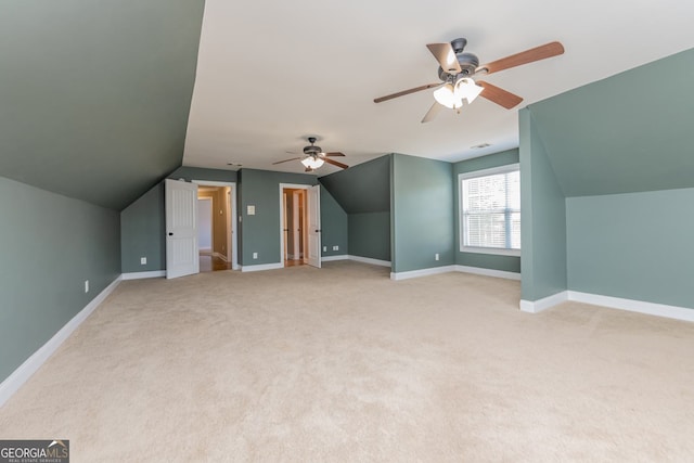 303 Sage Meadows Ln, Bonaire, GA 31005 - additional living space with lofted ceiling, ceiling fan, and light colored carpet